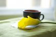 a cup of coffee and a calla