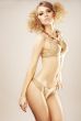 sexy fashion model in gold bikini