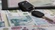 Documents on the car and money.