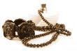 necklace, bracelet and parfume bottle