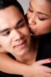 Gently kissing my Indonesian lover on his cheek