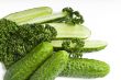 Cutted and whole  cucumbers and parsley, healthy food isolated o