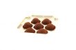 seven truffles in an open box