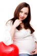 Pregnant woman in white