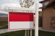 Blank Real Estate Sign in Front of House