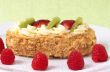 Fruit boat cake with raspberries