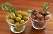 Two jars of green and black olives