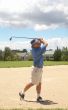 Senior golfer playing golf