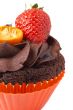Miniature chocolate cupcake with strawberry