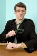 Person view a watch through a magnifier