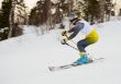 Woman rushing on skis