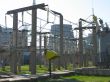 High voltage electric converters and cooling towers at a power plant