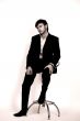 young man on high chair