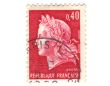 Old red french postage stamp with woman