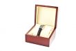 female silver watch in a wood gift box