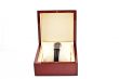 female silver watch in a wood gift box