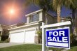 Red For Sale Real Estate Sign and House