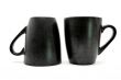 Two black cups up and down isolated
