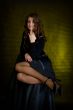 Beauty girl in black on dark background