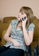 Girl speaks by a mobile phone