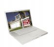 Home for Sale Sign & New Home on Laptop