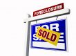 Blue Sold Foreclosure Real Estate Sign on White