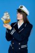 Portrait of the woman in a sea cap with the ship