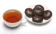 Marshmallow and cup with tea.