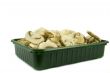 Sliced champignon mushrooms in green pack