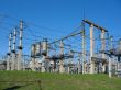 high-voltage substation on blue sky background with switch and connectors