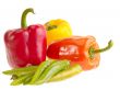 Different fresh tasty peppers on white wet background