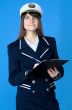 Girl in sea uniform with tablet