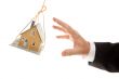 Swinging House and Business Man`s Hand Reaching or Pushing