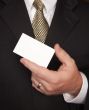 Businessman Holding Blank Business Card