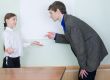 Tutor explains something to the girl