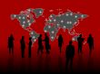 business people in front of a world map