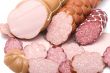 Cutting sausage closeup