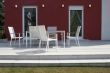 Garden armchair in front of house