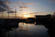 Boats on the pier at sunset