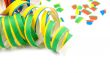 Colorful party streamers on white background