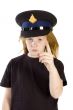 young girl with police hat is giving a warning sign