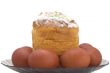 Easter sweets and eggs in plate