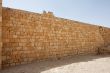 Ancient yellow stone wall