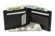Black wallet with business cards and banknotes