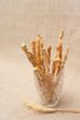 Breadsticks with seeds in vase