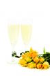 Glasses of champagne and roses