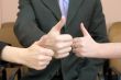 Team show thumb up
