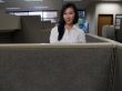 Woman in cubicle