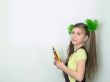 Girl with color pencils and a sheet of paper