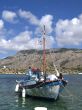 Boat in harbour of island Symi